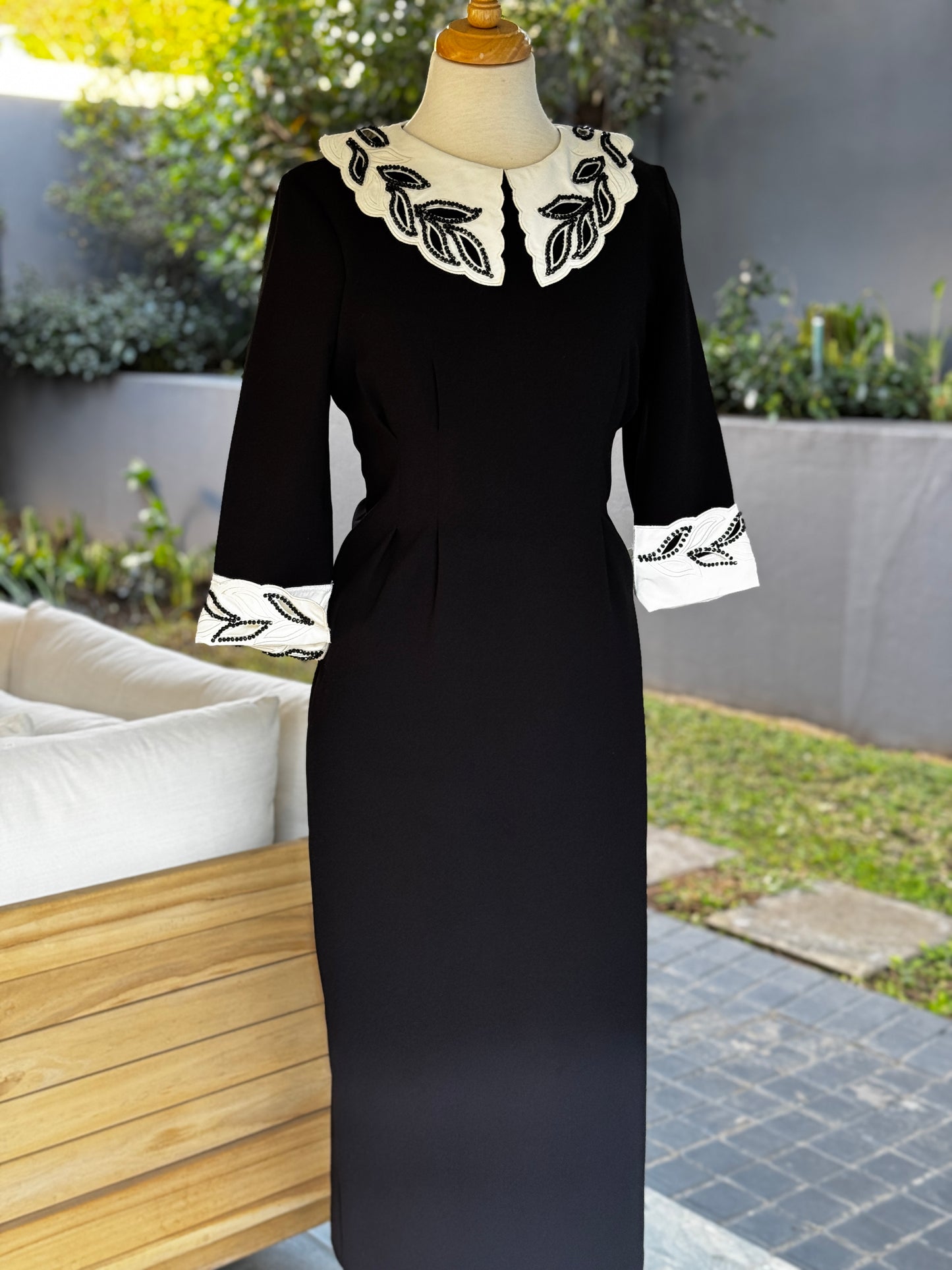 Vintage-Inspired Black Midi Dress with Embroidered Collar and Cuffs